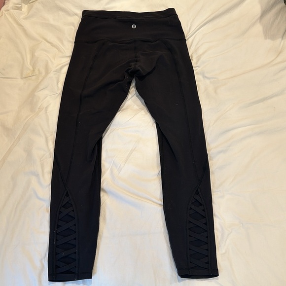 Black Lululemon Athletica High Rise Criss Cross Ankle Leggings - Picture 4 of 8